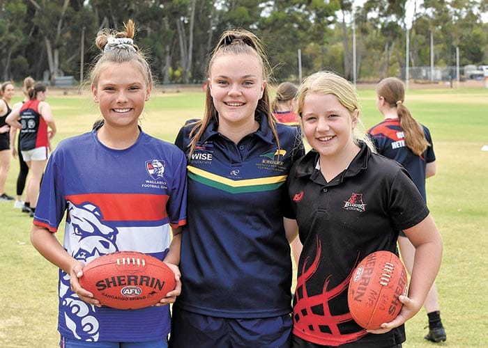 Girls flock to footy try outs