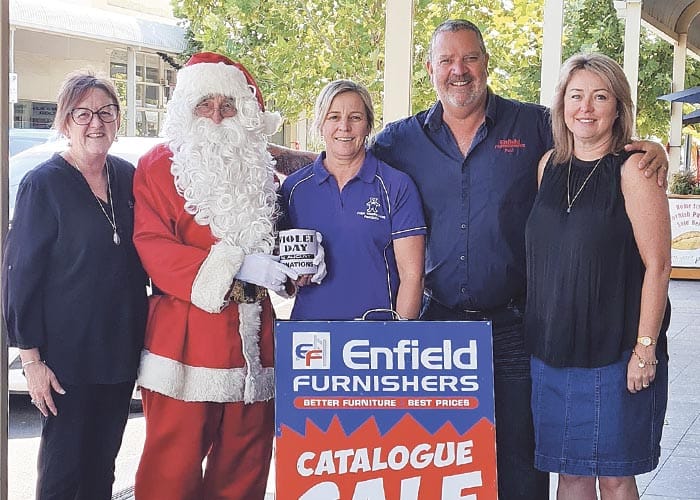 Santa helps Violet Day fundraising