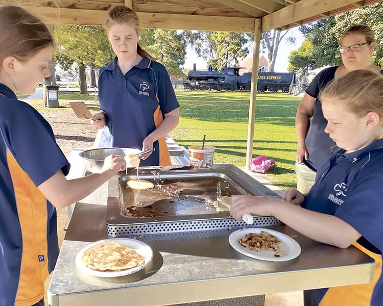 Guides: teamwork, community involvement and friendship