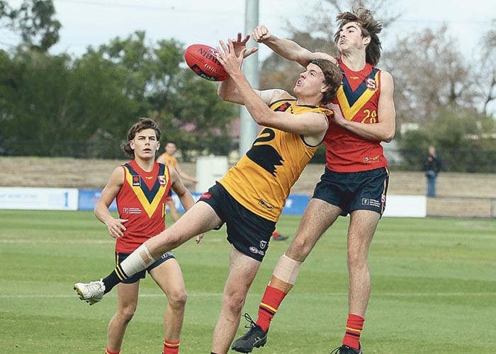 Local lads kicking goals in state team