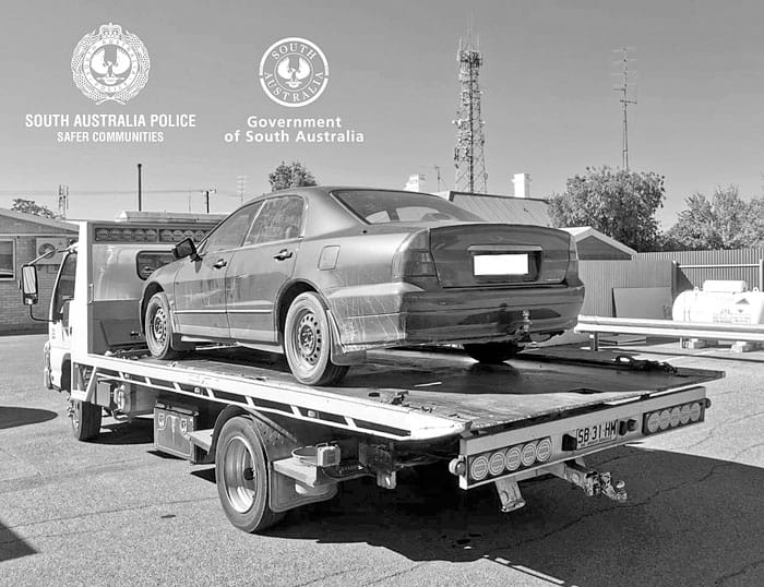 Woman allegedly drives at police – with infant in her car