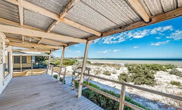 Beachfront home sells for almost $1 million