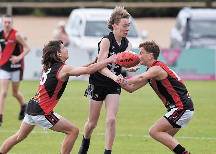 Kadina triumphs in slippery conditions