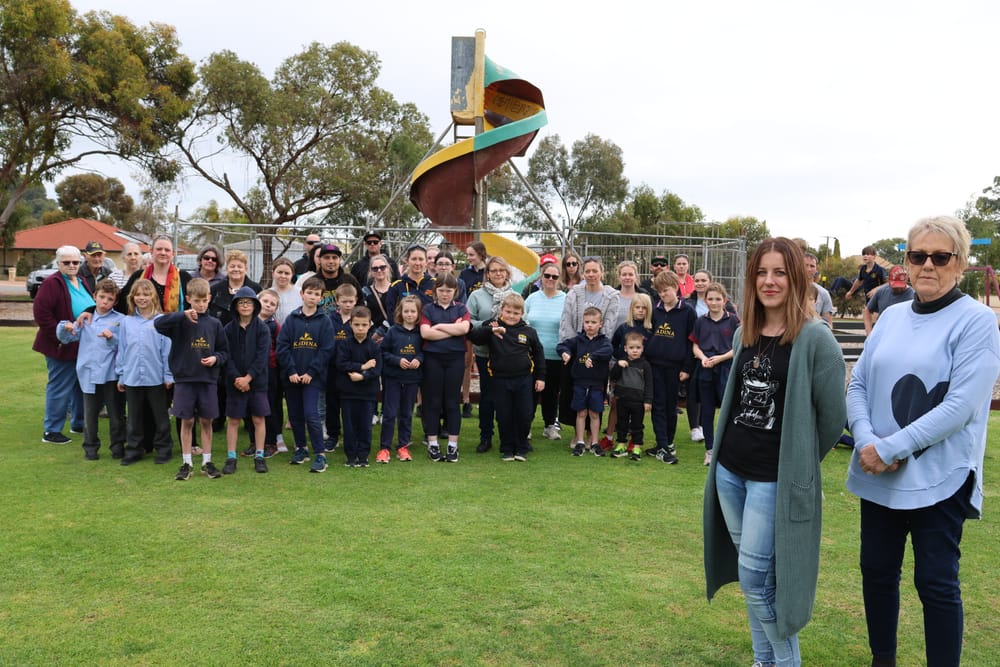 Residents rally to retain iconic slide post image