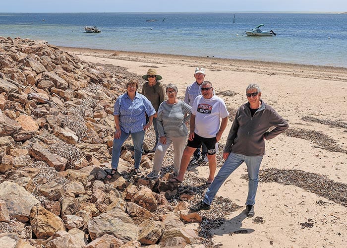 Races halted by great wall of Fisherman Bay post image