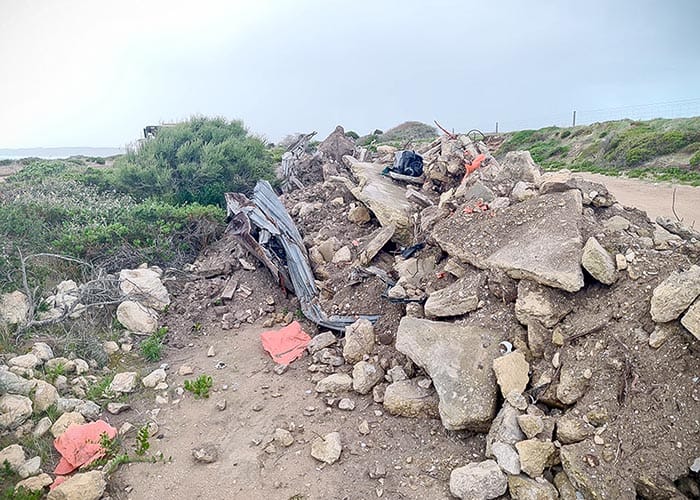 Asbestos uncovered at illegal dump post image