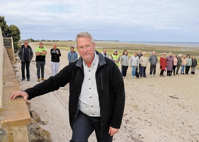 Standing up against wall post image