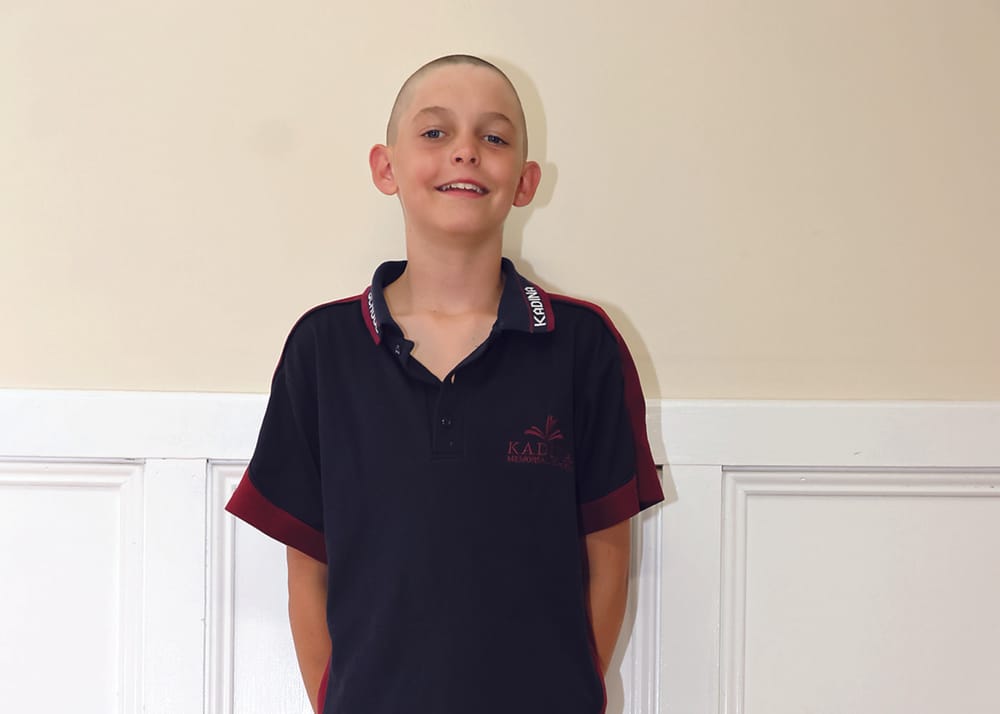 Mullet no more:  Tyson’s chop raises  over $5K for charity post image